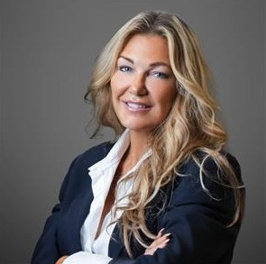 Angela Glazema Sutton Realty Headshot Angela Glazema Headshot: A white woman with blonde highlights in a suit.